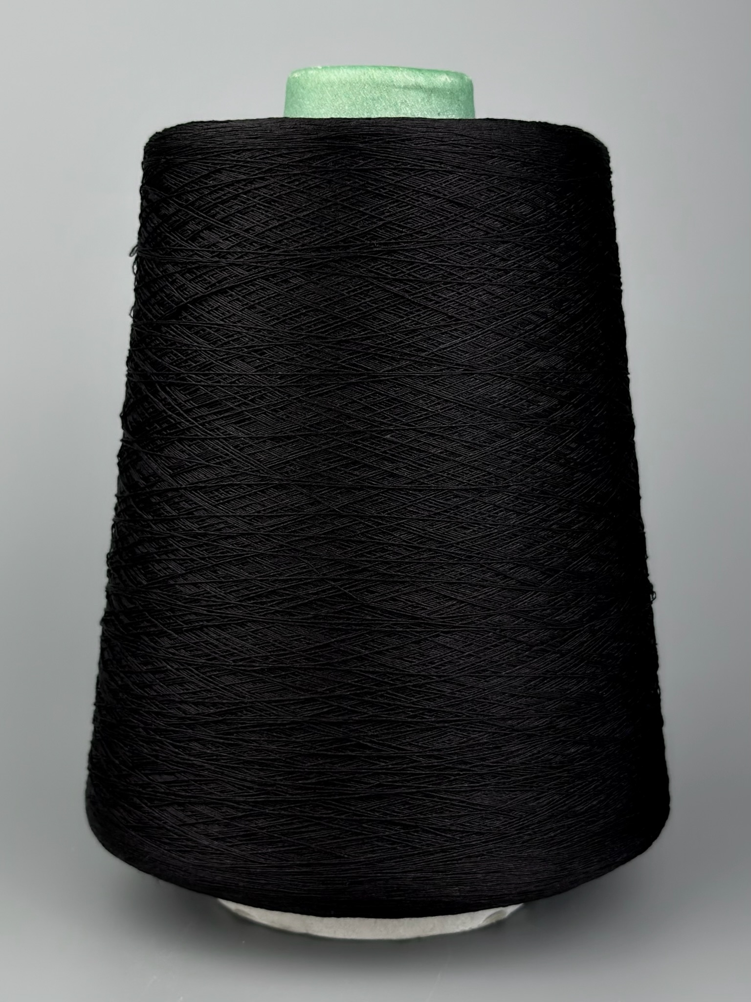 Art. Spiral Nm 3/90 – Schappeseidengarn mit Elasthan col. Schwarz foto 2